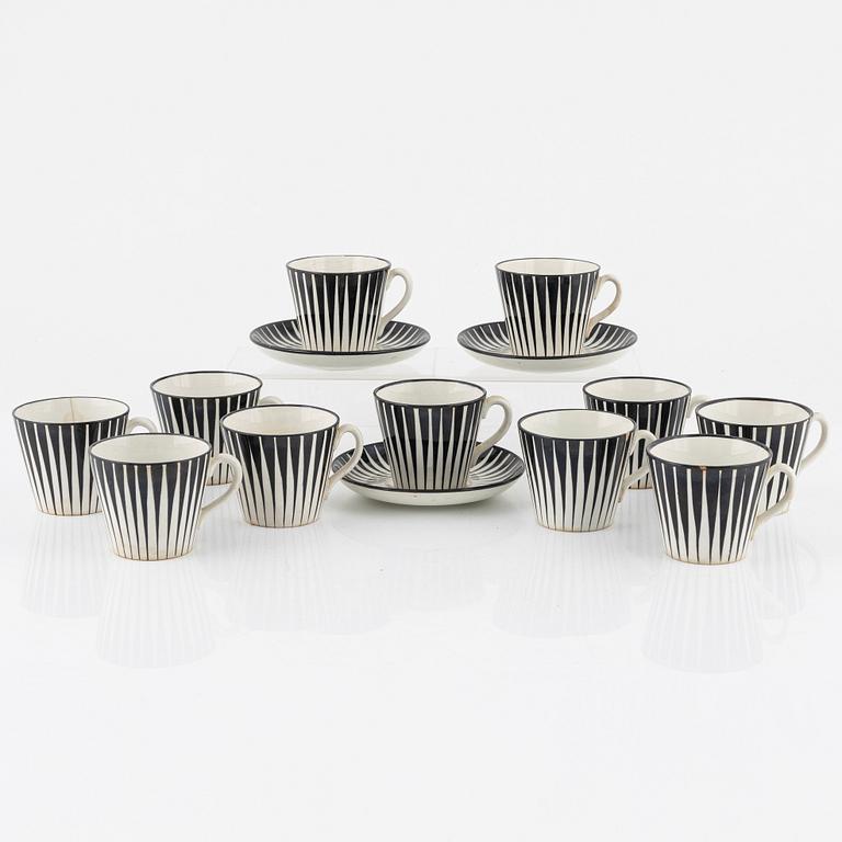 Eugen Trost, eleven coffee cups with three saucers, 'Zebra', Upsala-Ekeby Gefle.