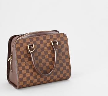 1369. A damier handbag from Louis Vuitton.