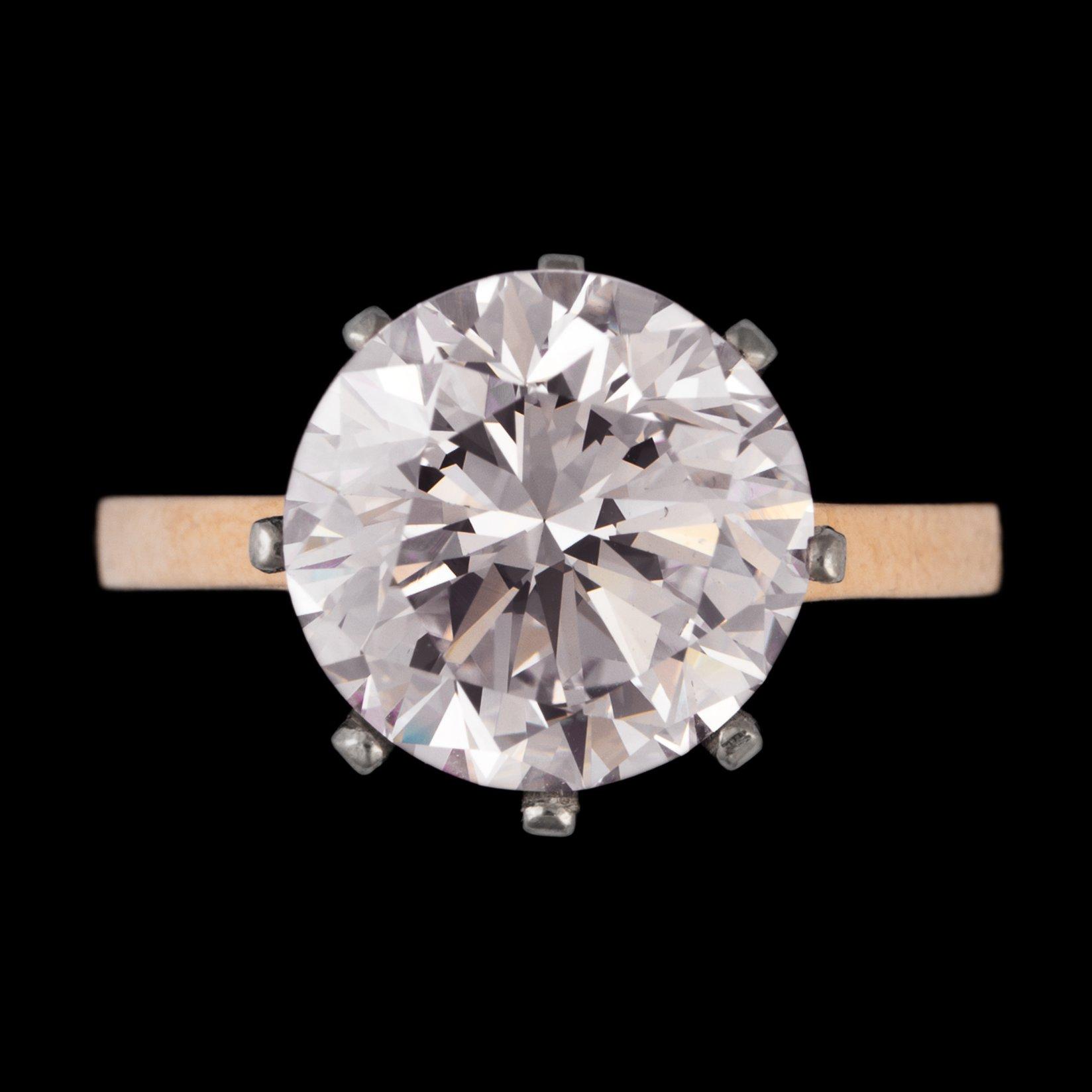 A fancy light pink brilliant cut diamond ring, 4.86 cts.
