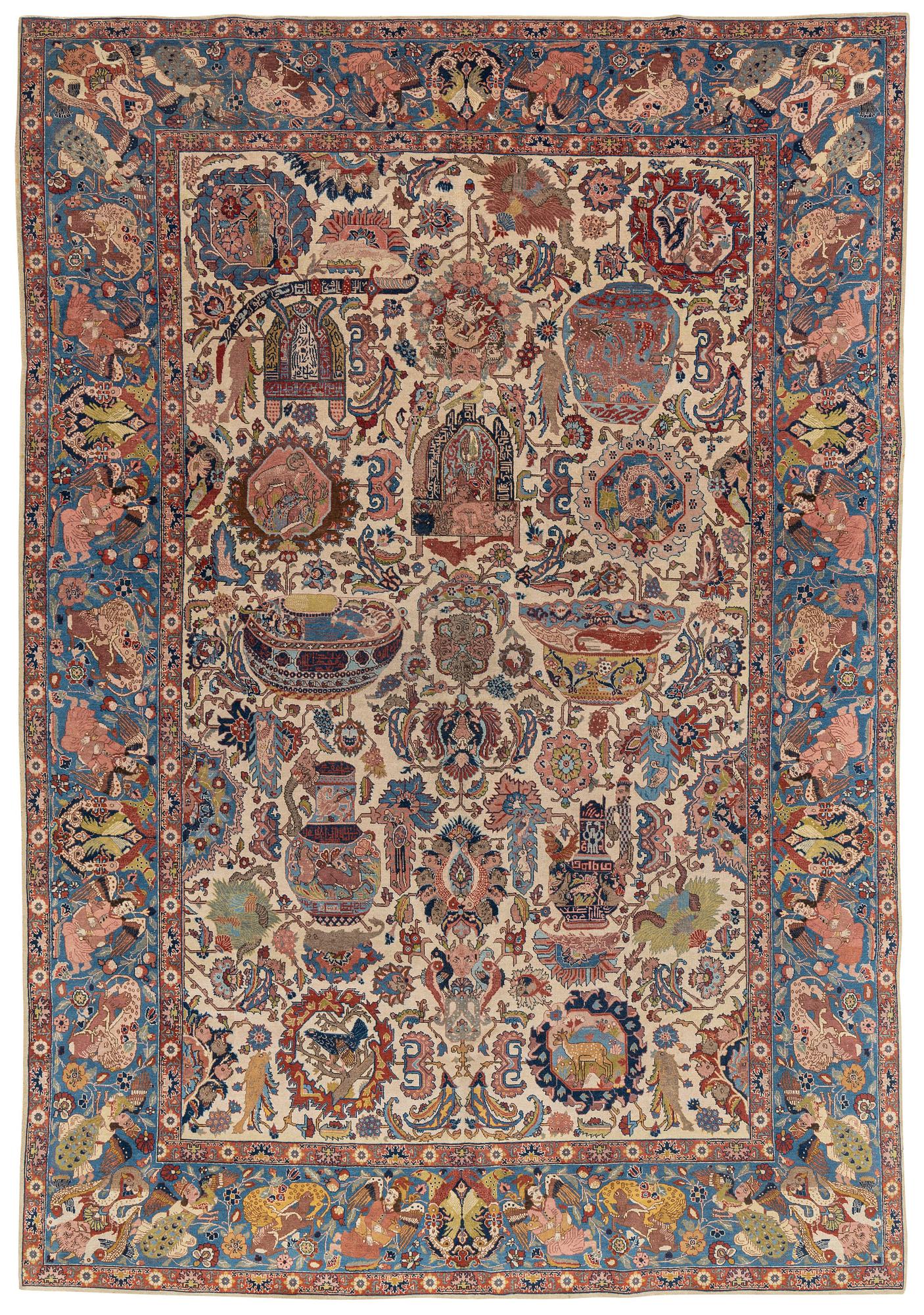 A semi-antique Tabriz ‘Zir Khaki' carpet, ca 366 x 251 cm.