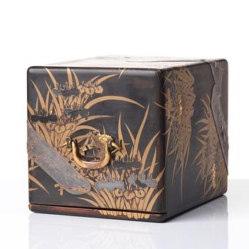 A Japanese lacquered box with four drawers, Meiji period (1868-1912).