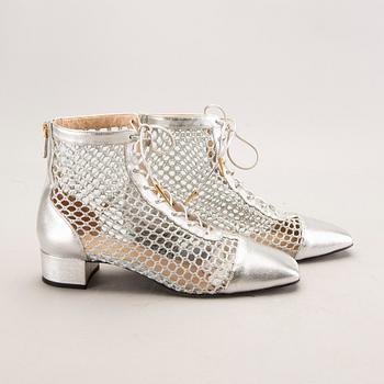 Dior skor ett par "Naughtily" storl 39 1/2.