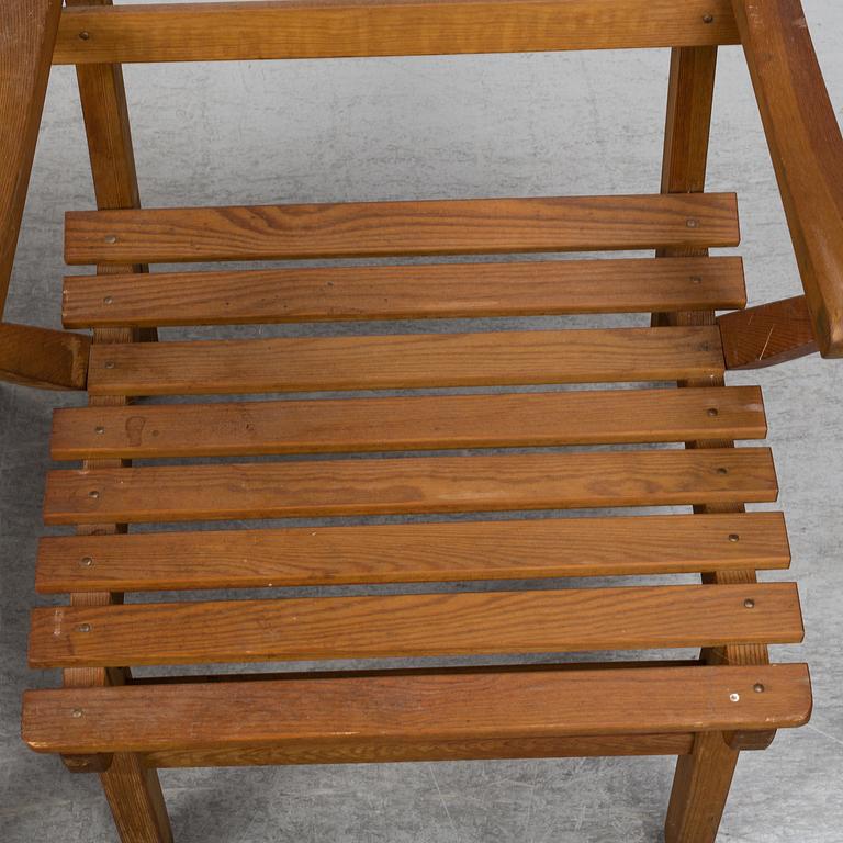 A Carl Malmsten "Bergshamra" garden table and four chairs, first half of the 20th century.