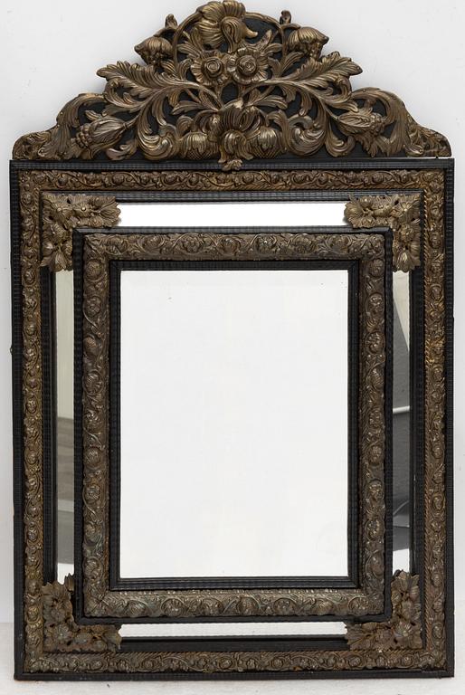 A Baroque style mirror, circa 1900.