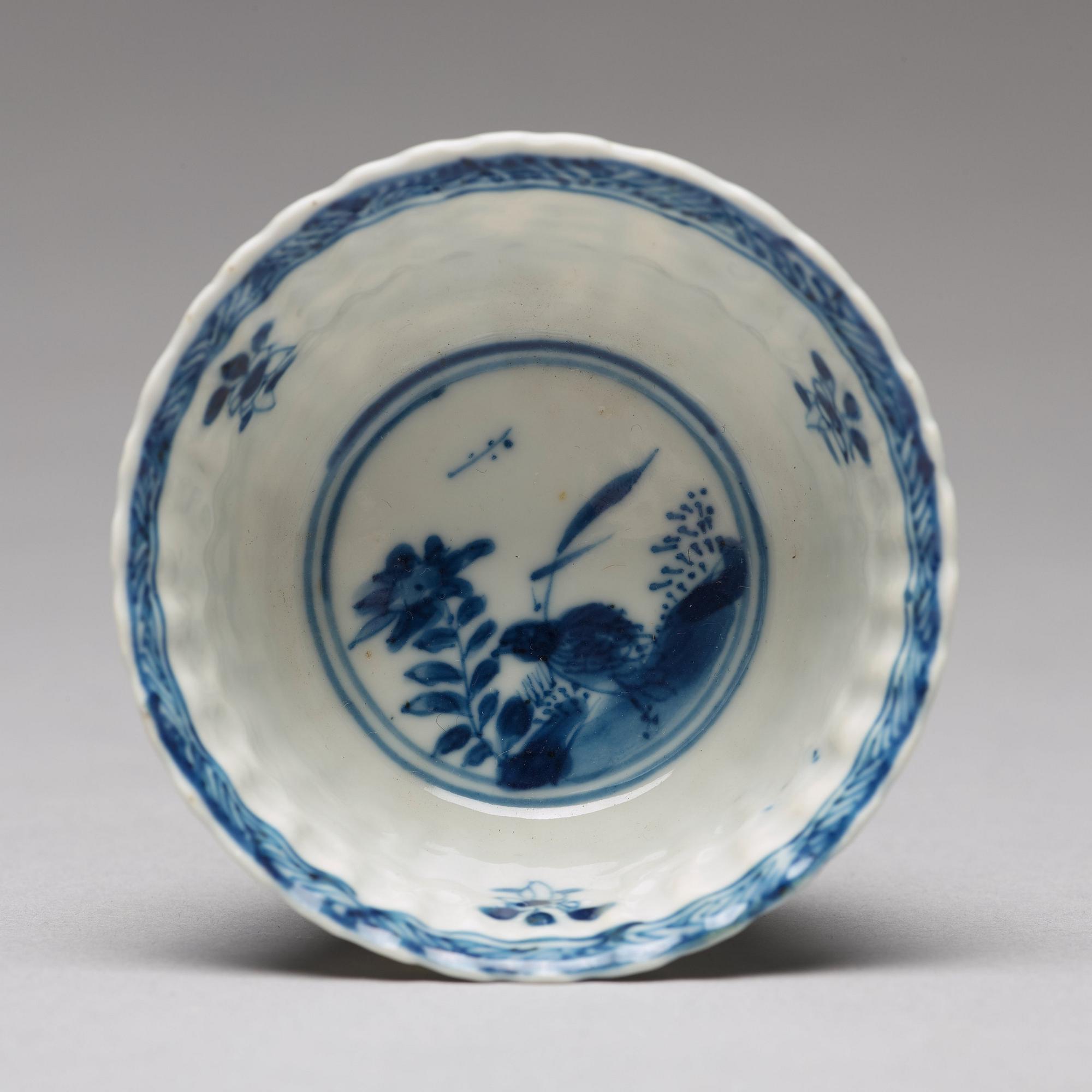 Seven matched blue and white cups with four dishes, Qing dynasty, Kangxi (1662-1722).