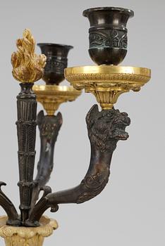 A pair of three-light candelabra, late Empire-style.