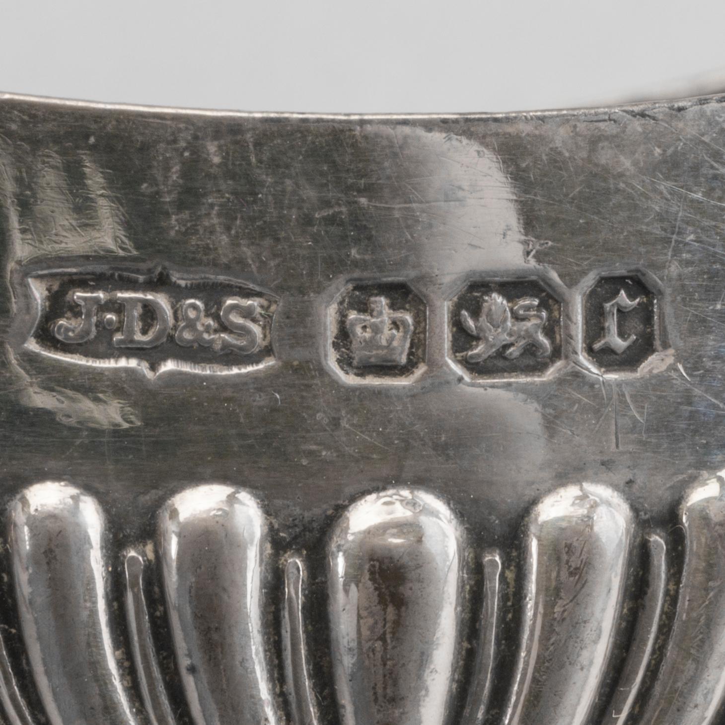 An English set of four silver salters with spoons mark of James Dixon & sons Sheffield 1895, weight 166 gr.
