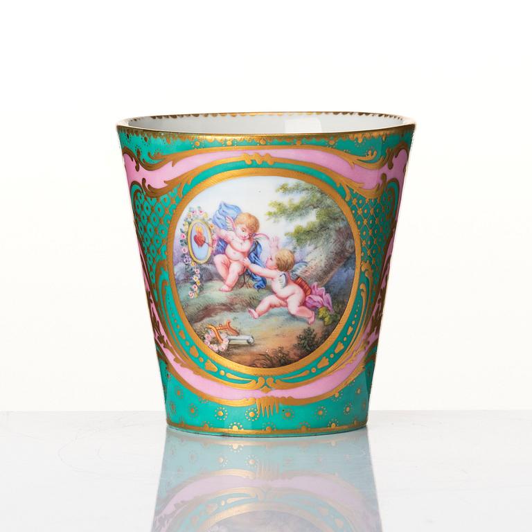 A French 'Sèvres' cup and tremleuse saucer, 19th Century.