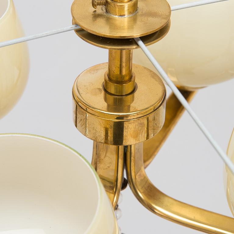 Paavo Tynell, kattovalaisin, malli 1359/4 Taito 1900-luvun puoliväli.