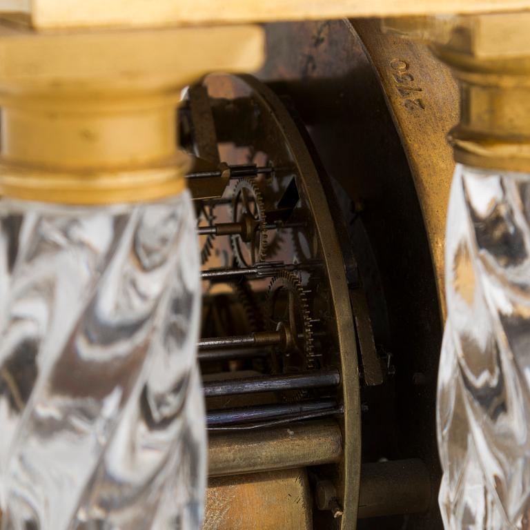 A french late Empire mantelpiece clock, first half of the 19th century.