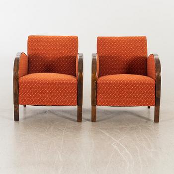 A pair of 1930/40:s Art Deco easy chairs.