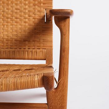 Hans J. Wegner, a pair of oak and rattan 'CH27' chairs, Carl Hansen & Søn, Odense Denmark 1950s-1960s.