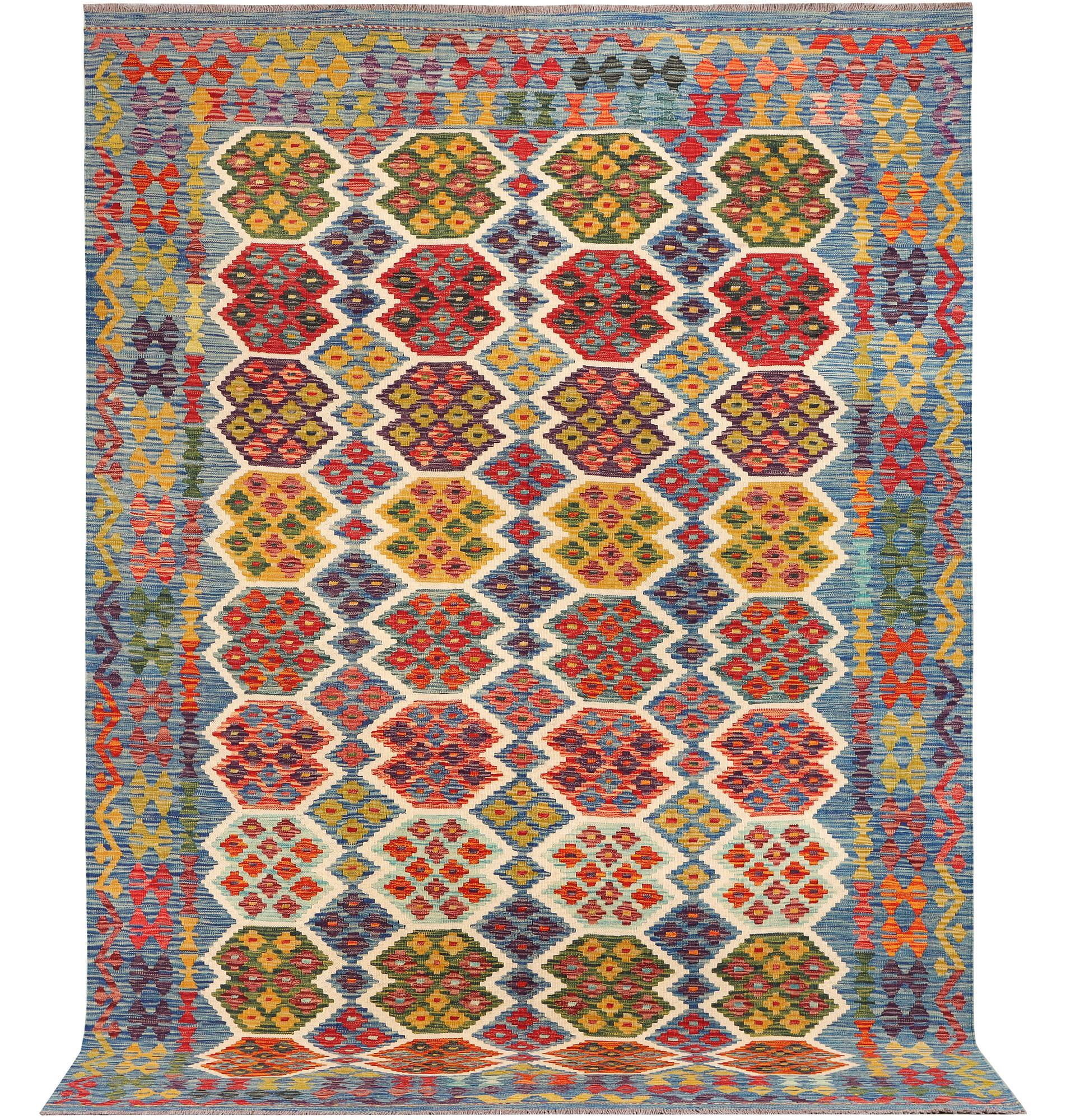 An Afghan Kilim carpet, c. 297 x 206 cm.