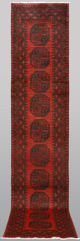 An Afghan runner, ca 383 x 78 cm.