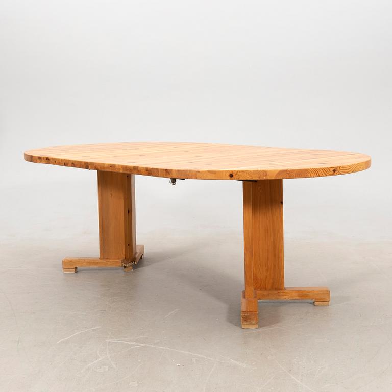 A pine dining table, 1970s.