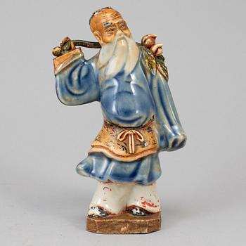 A clay figure of a daoist, 20th century.