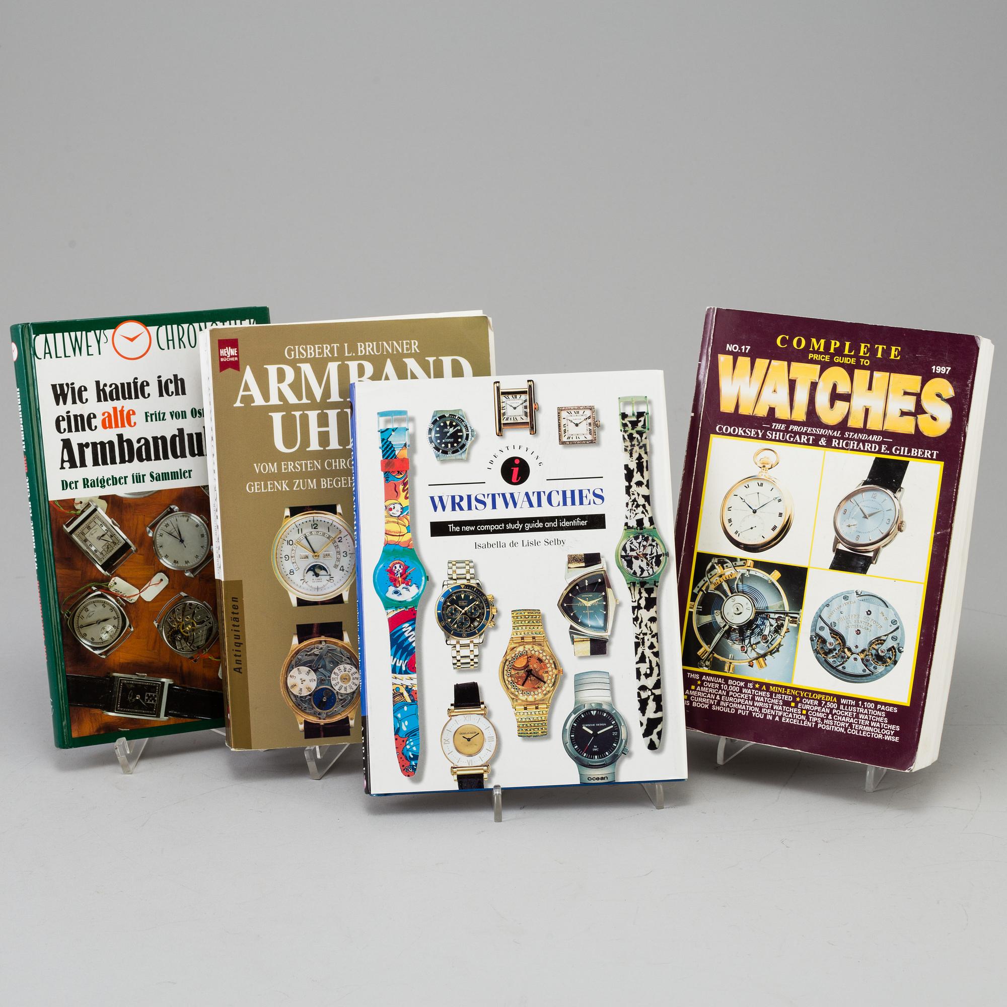 A lot of eleven books and booklets regarding watches.