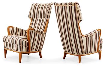 A pair of Nordiska Kompaniet armchairs, probably by Elias Svedberg, 1940's-50's.