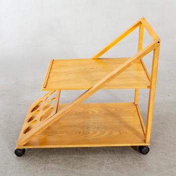 An Italian oak trolley later part of the 20th century.