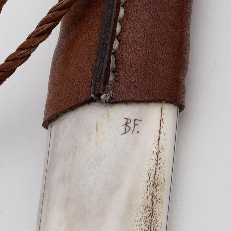 A reindeer and buffalo horn knife by Bertil Fällman, signed.