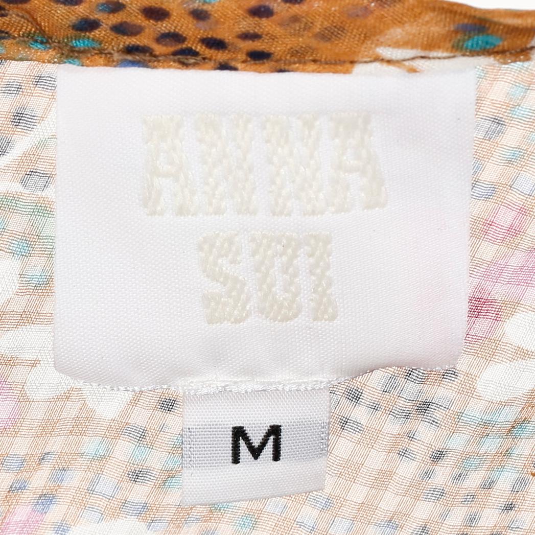 ANNA SUI, a silk dress.