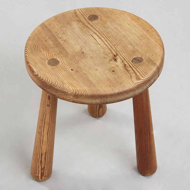 An Axel Einar Hjorth stained pine 'Utö' stool, Nordiska Kompaniet, Sweden 1930's.