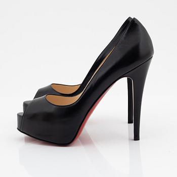 Christian Louboutin, a pair of black leather peep toe pumps, size 37 1/2.