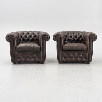 A pair of model Chesterfield armchairs, OY BJ Dahlqvist AB, BD Furniture,Finland, second half of the 20th century.