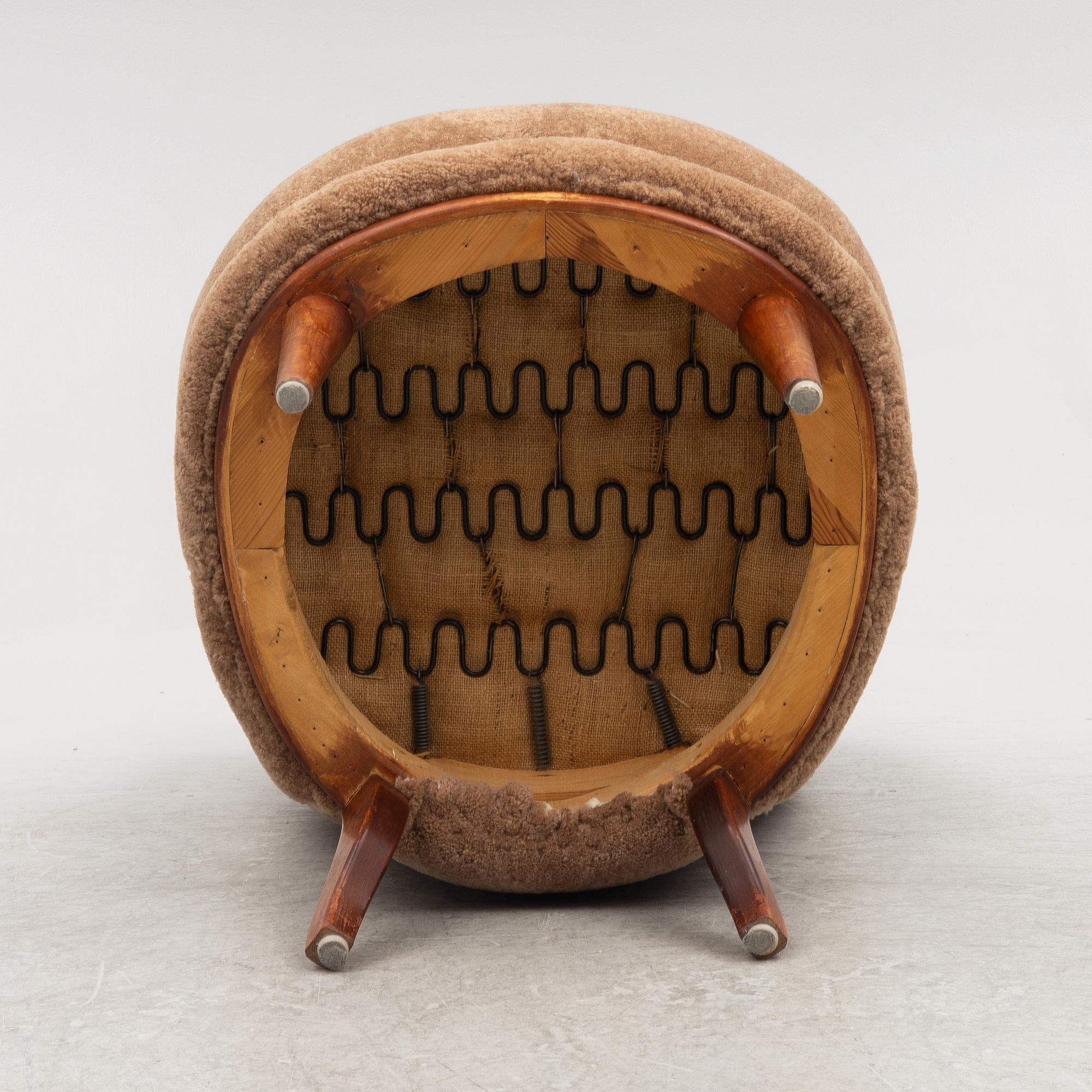 A mid 20th century easy chair,.