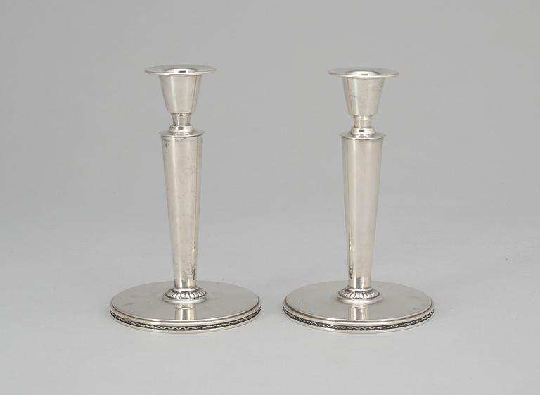 A pair of Eric Råström silver candelsticks by CG Råström, Stockholm 1948.