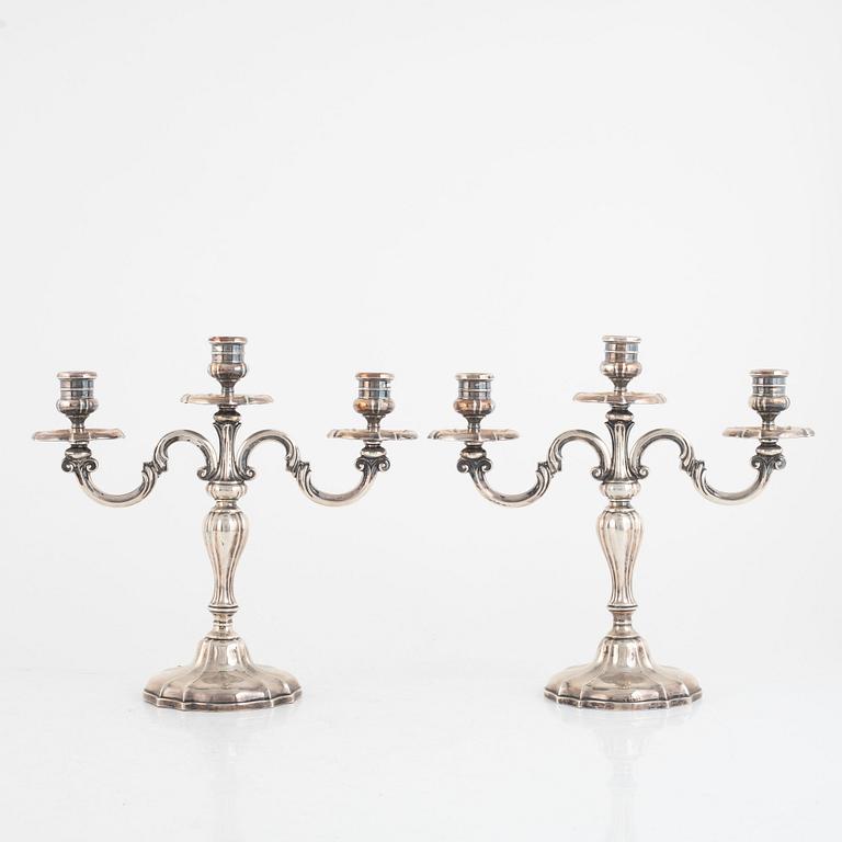 Kandelabrar, ett par, silver, svensk importstämpel K Anderson, Stockholm 1929.