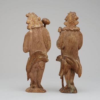 A pair of Baroque oak sculptures.