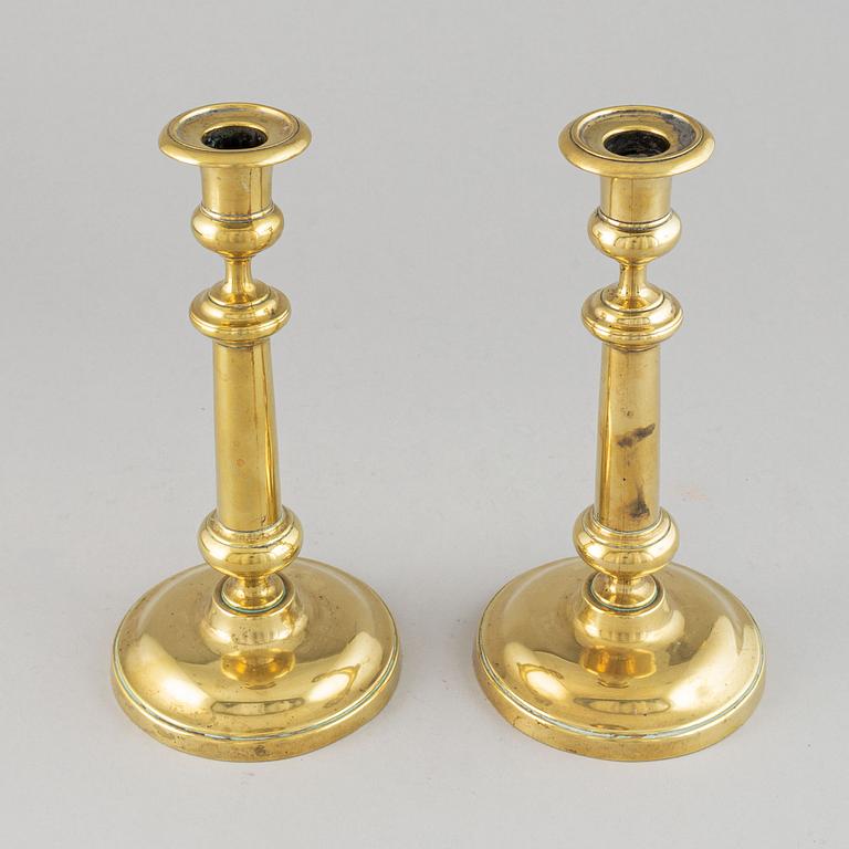 A pair of bronze Rmpire candlesticks, first half of he 19th century.