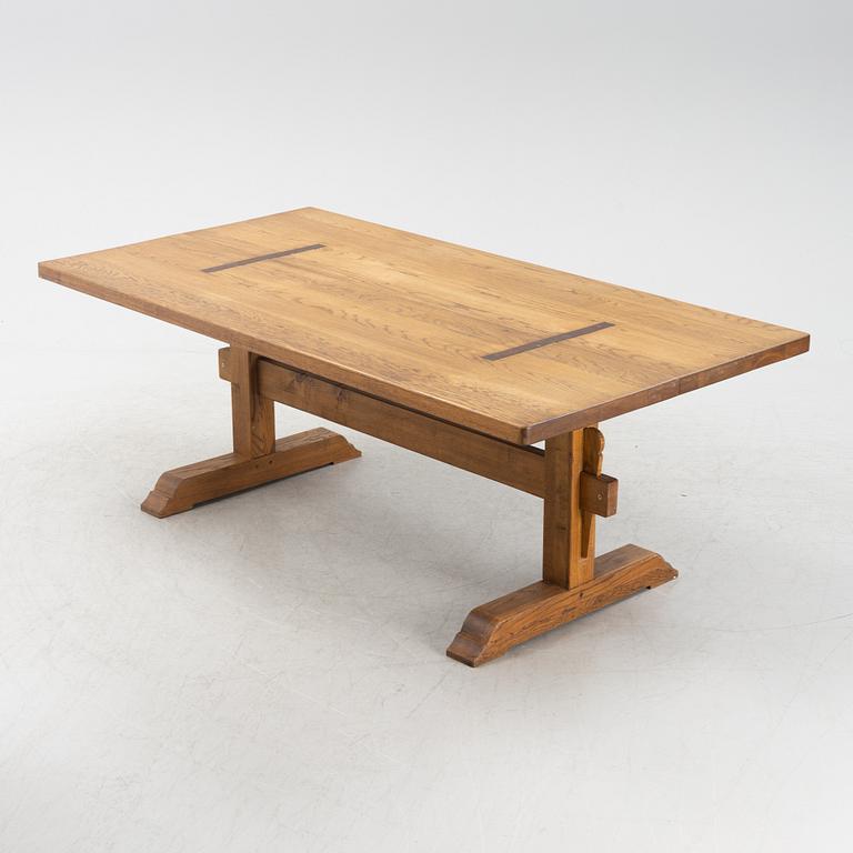 An oak trestle table.