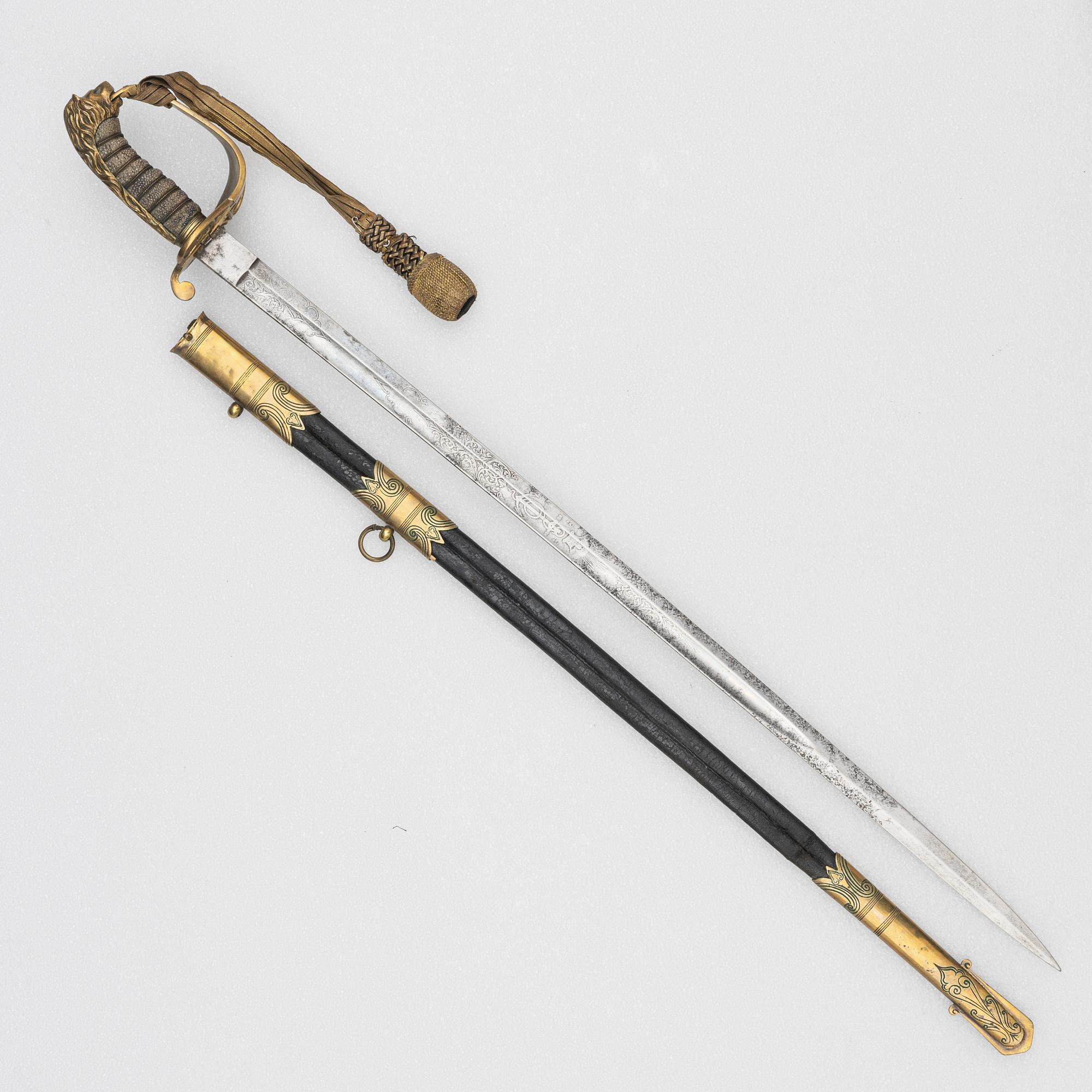 A Britiish Navy officer's sword 1827 pattern with scabbard.