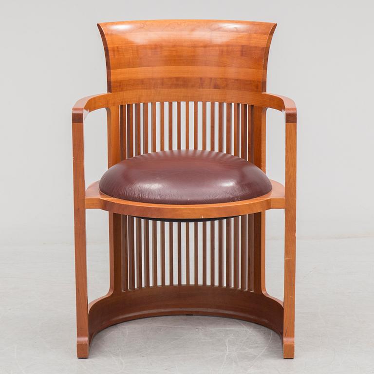 FRANK LLOYD WRIGHT, A cherry wood 'Barrel chair' from Cassina, late 20th century.