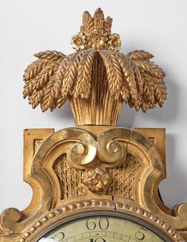A Gustavian giltwood cartel clock by L. Adamson Wester (watchmaker in Stockholm 1780-95).