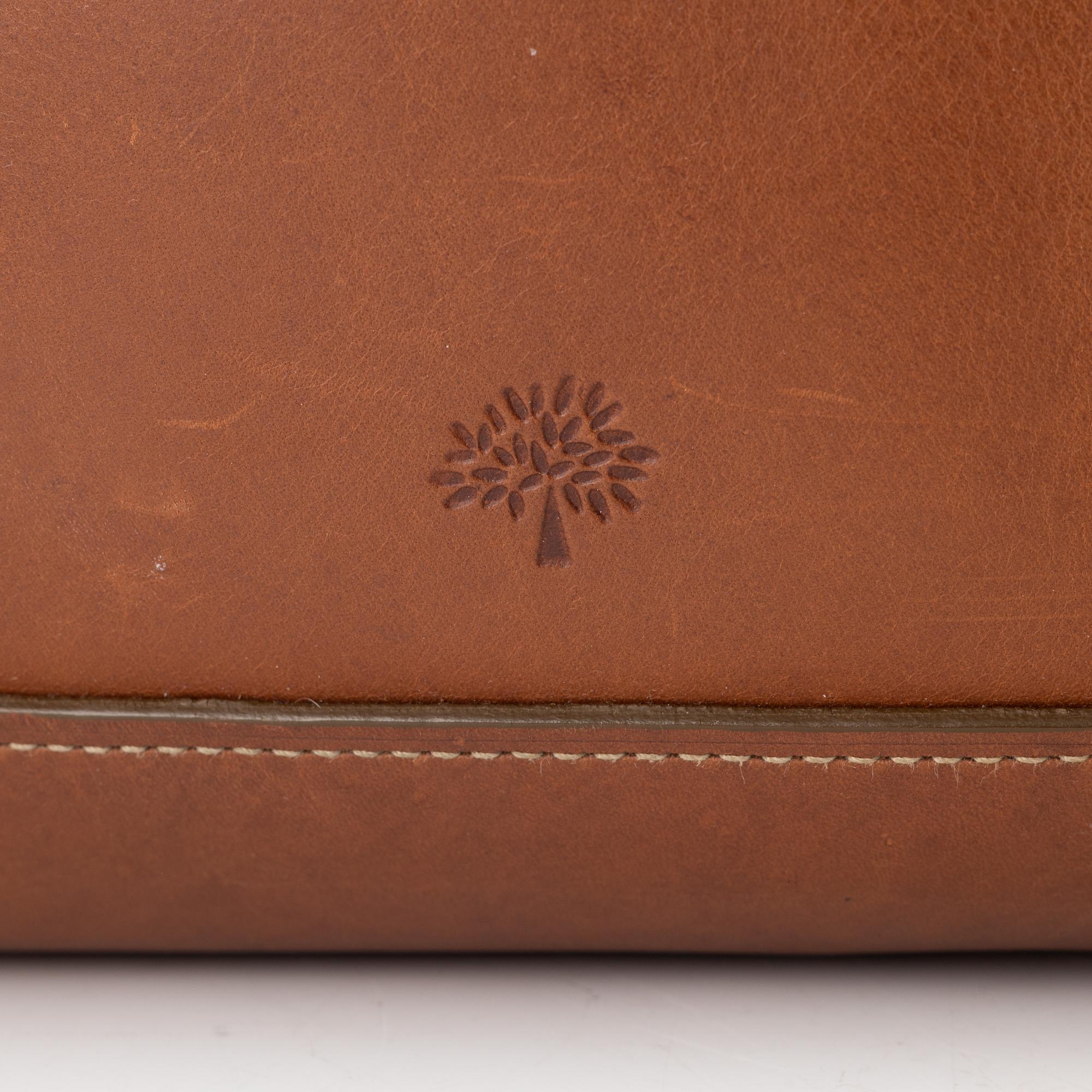 Mulberry, a brown leather 'Calder Tote' weekend bag.