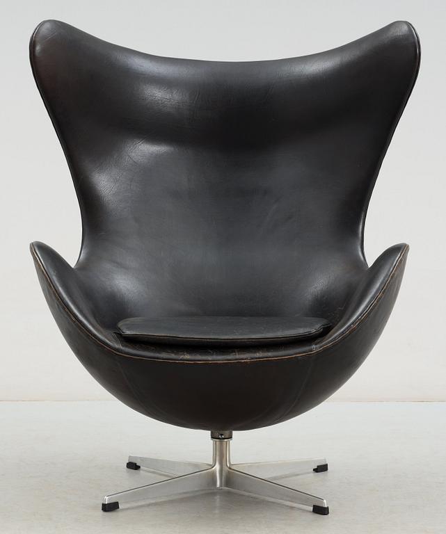 An Arne Jacobsen black leather 'Egg' chair, Fritz Hansen, Denmark, circa 1960.