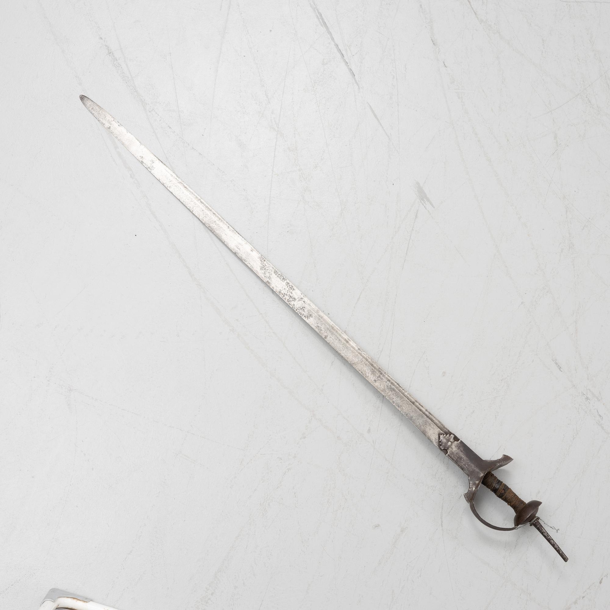 An Indian Khanda style sword, 19th / 20th Century.