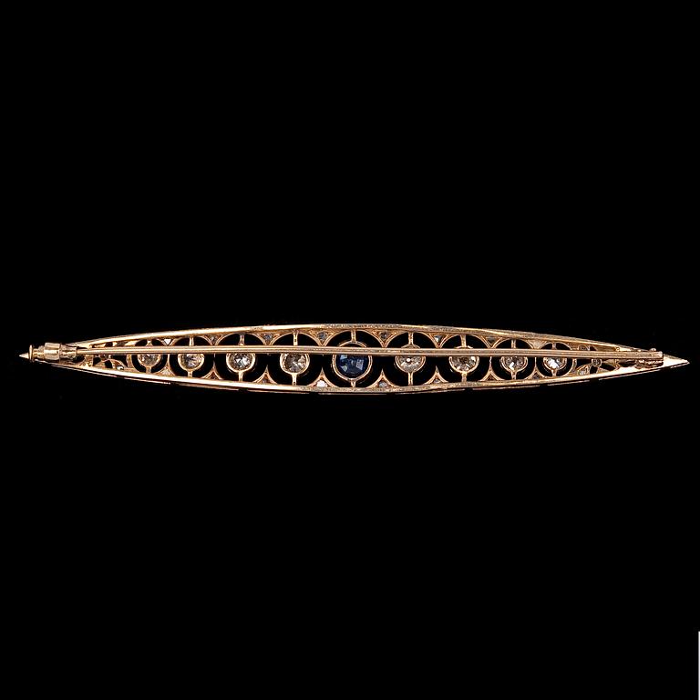 A BROOCH, old cut diamonds c. 1.10 ct, blue sapphire.