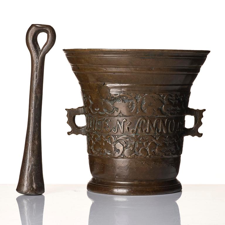 A Swedish late baroque bronze mortar and pestle, dated 1759.