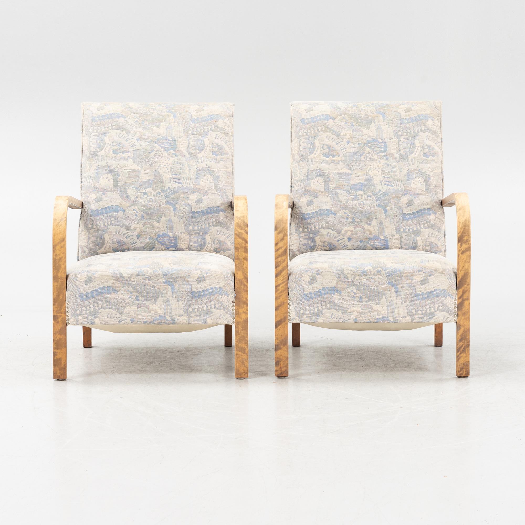 A pair of 1930's armchairs.