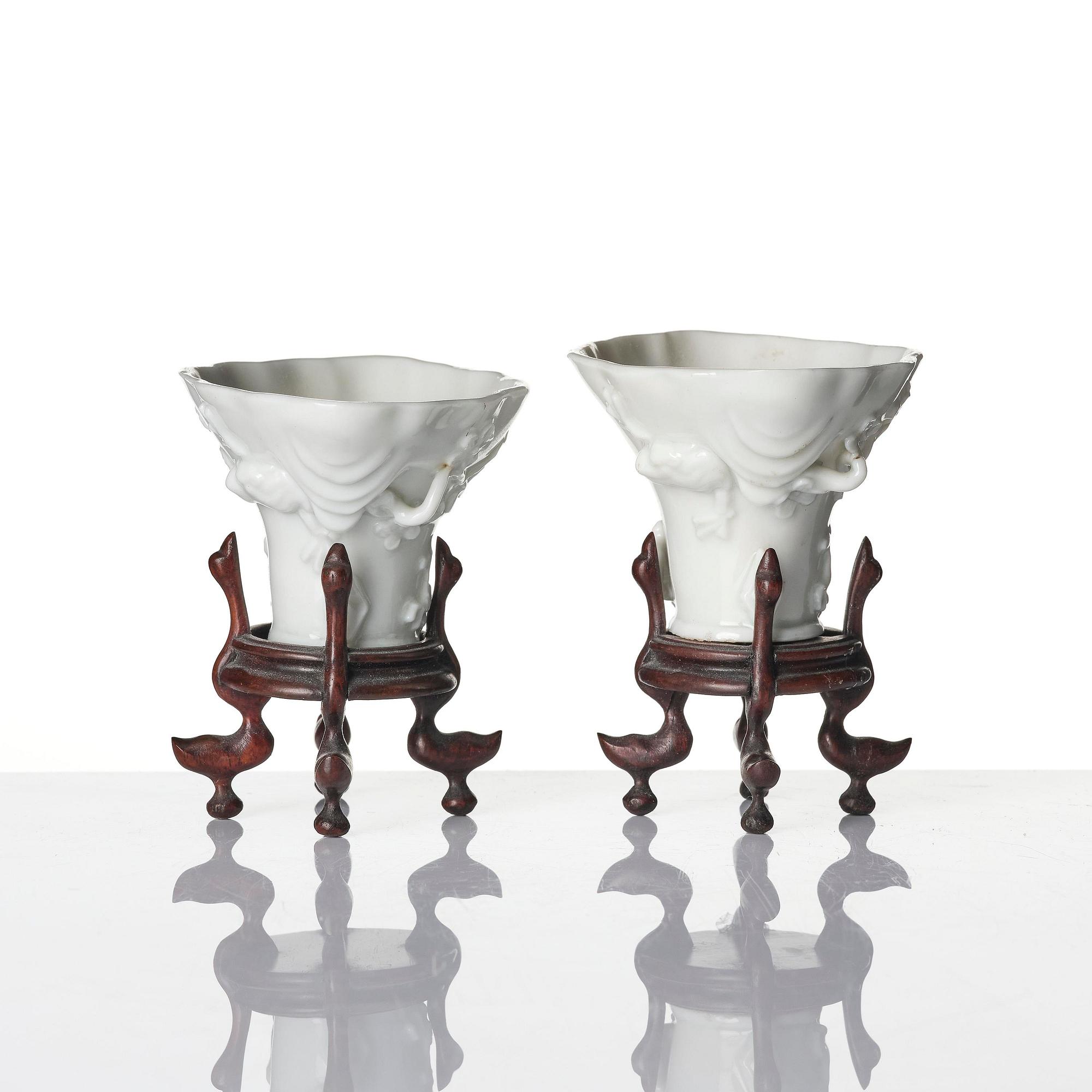 Two blanc de chine rhinoceros libation cups, Qing dynasty, Kangxi (1662-1722).