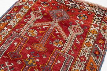 A semi-antique Anatolian rug, possibly Konya, approximately 152 x 117 cm.