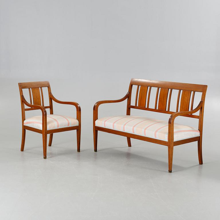 A sofa, six chairs and one table in Swedish Karl-Johan style, made in the first half of the 20th century.