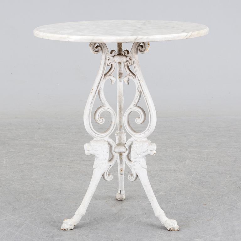 a late 20th century cast iron garden table.
