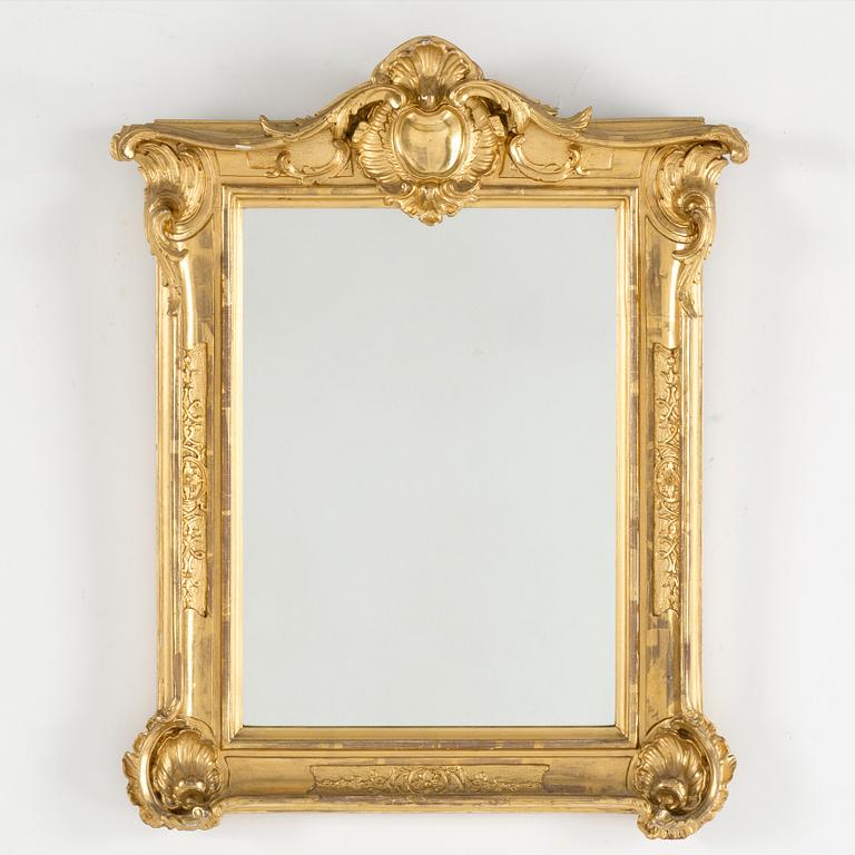 A carved gilt-wood 'Rococo' frame, possibly 18th century.