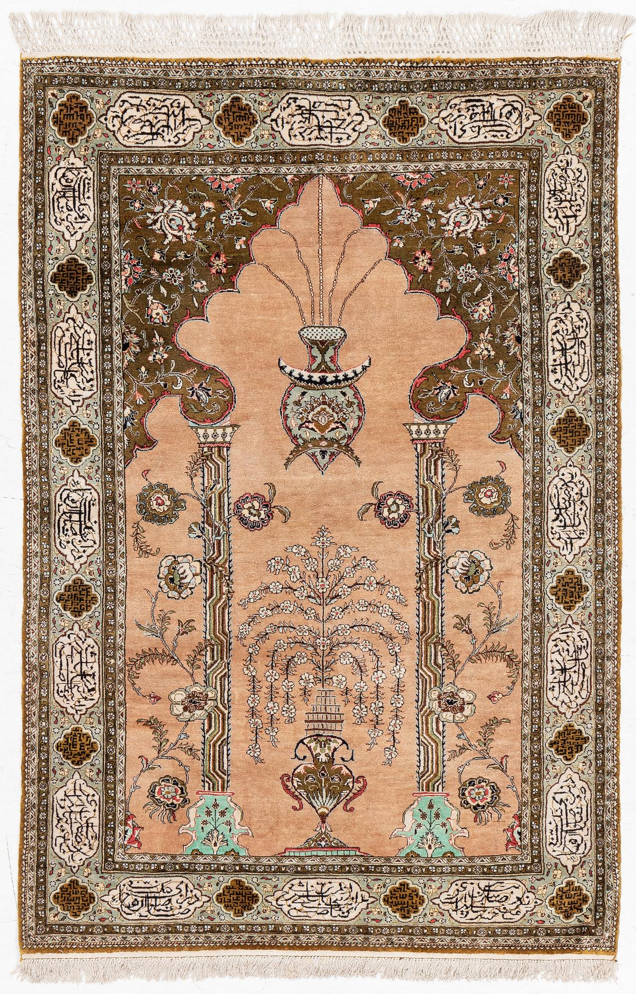 A silk Quum rug, c. 155 x 103 cm.