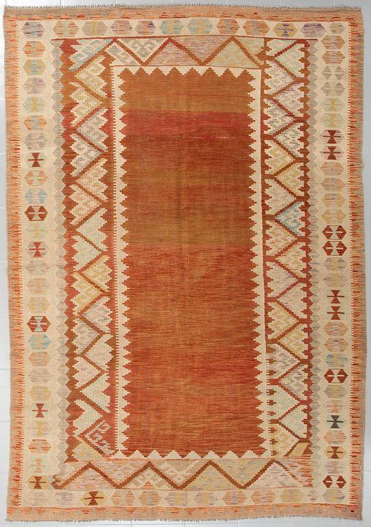 A kelim rug, 290 x 198 cm.